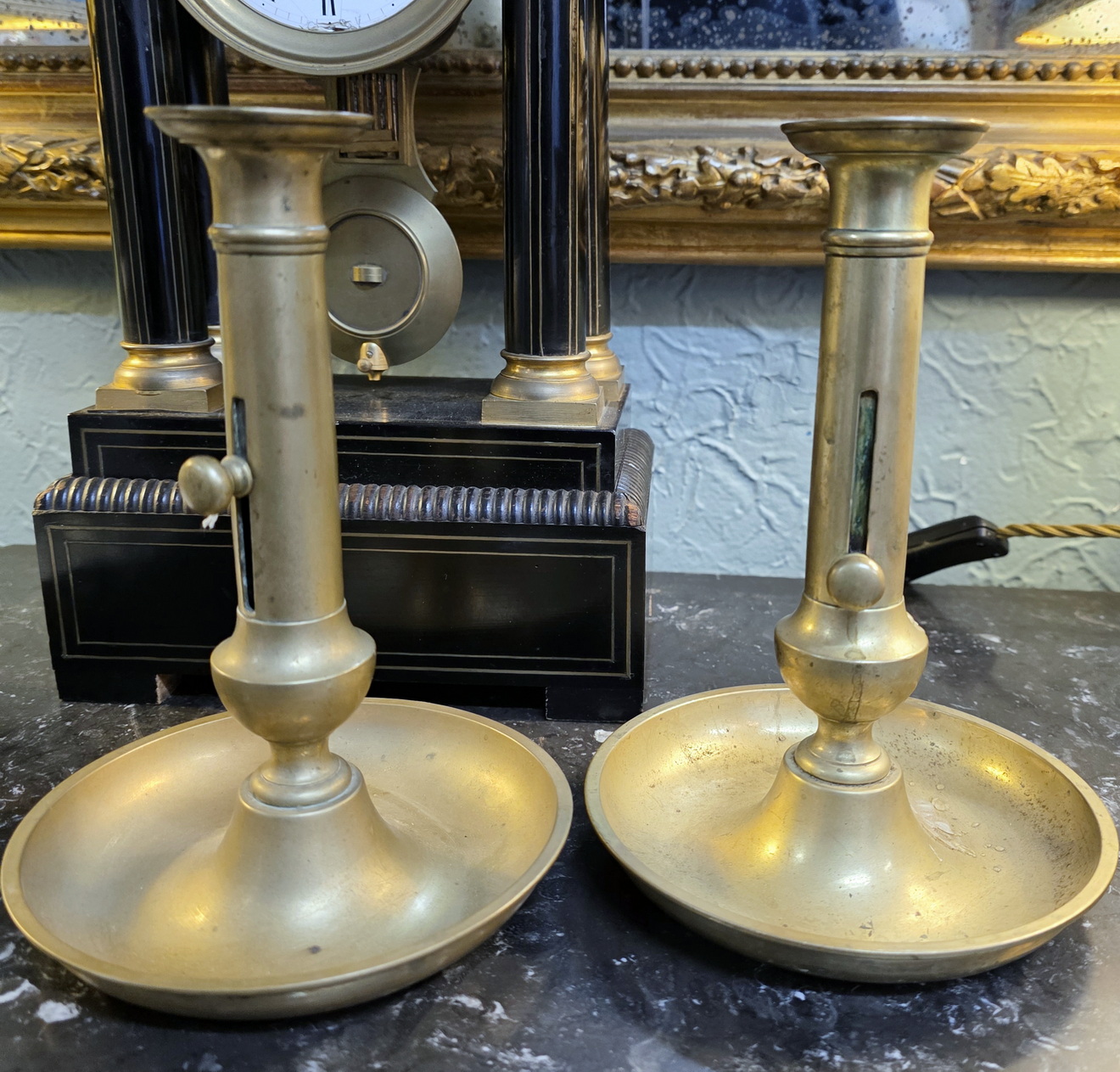 A pair of French Provincial Candlesticks 